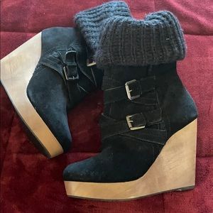 Black suede boots with sweater cuff